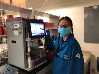 Lab member working at the bench